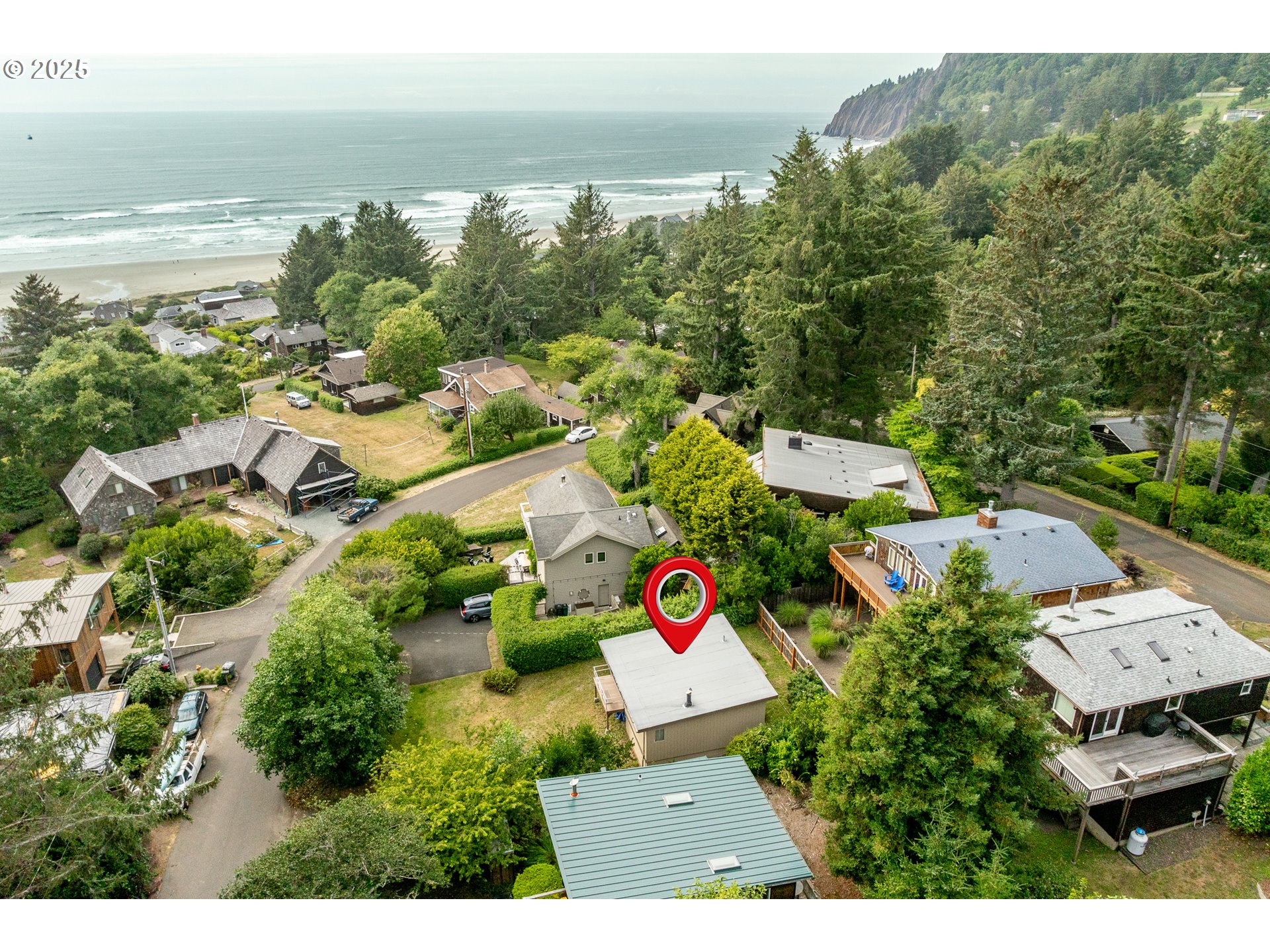 37365 4th Street Nehalem, OR 97131 - Photo 24 of 27 an aerial view of multiple house
