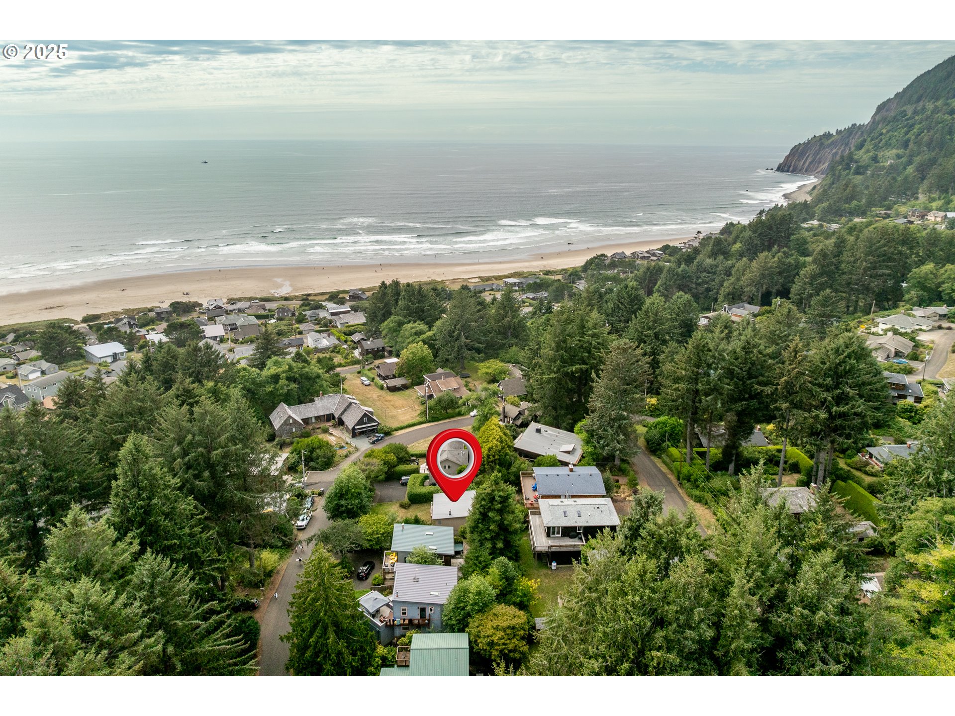 37365 4th Street Nehalem, OR 97131 - Photo 25 of 27 a view of an ocean and beach