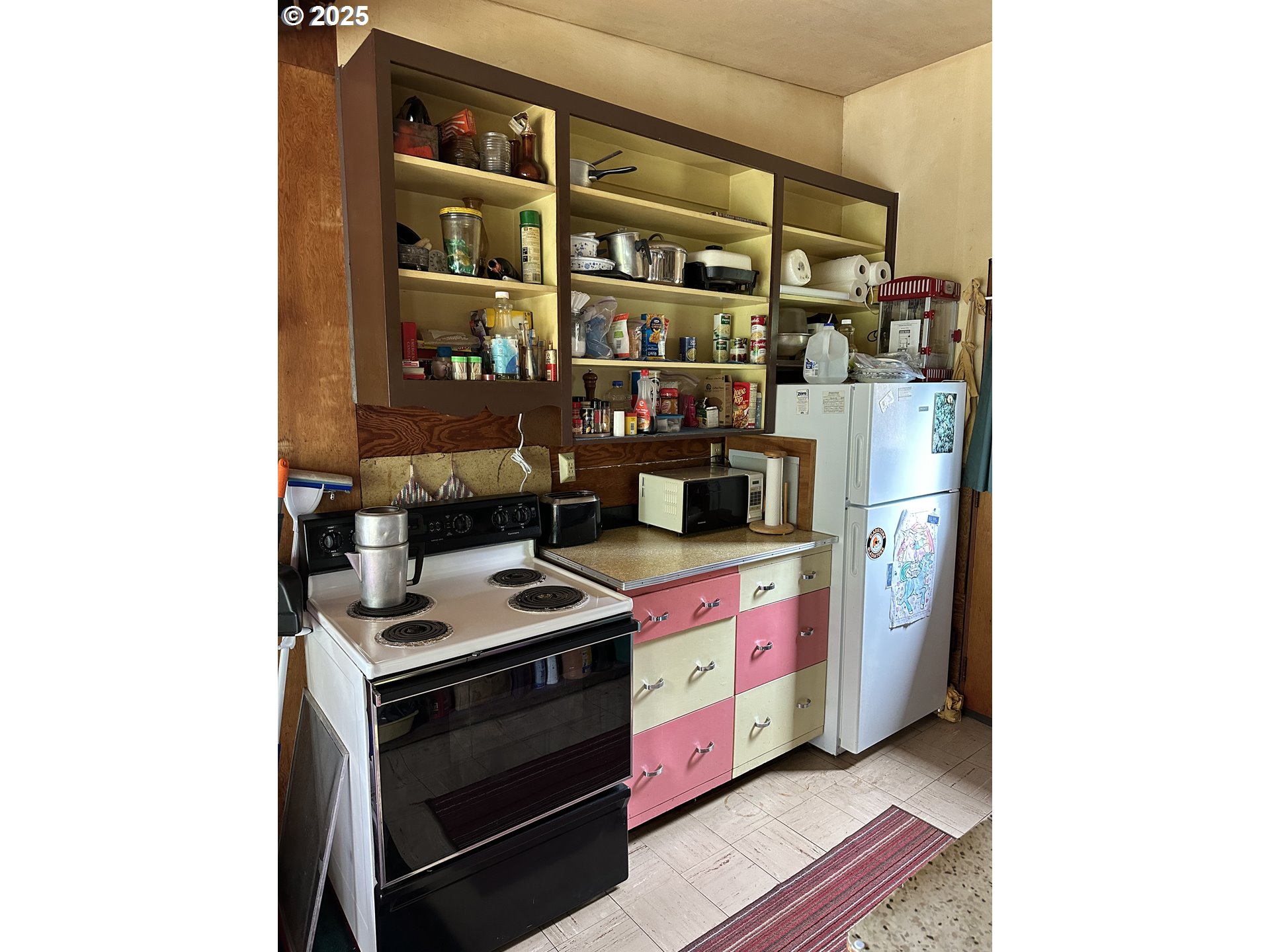 37365 4th Street Nehalem, OR 97131 - Photo 6 of 27 a room with storage and utility