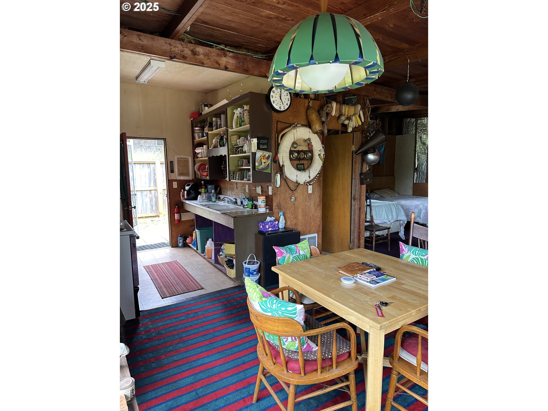 37365 4th Street Nehalem, OR 97131 - Photo 8 of 27 a table and chairs in a room