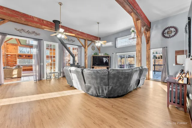 a view of wooden floor and a covered with snow