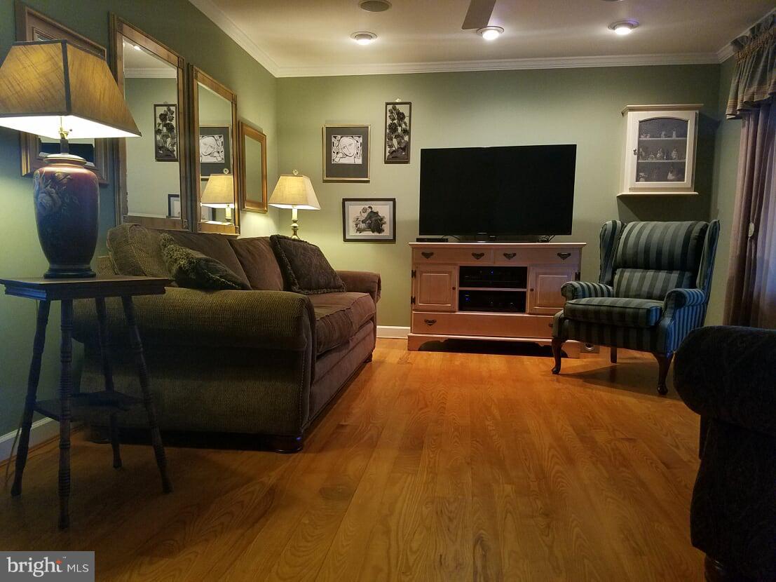 4547 Main Street Rohrersville, MD 21779 - Photo 5 of 28 a living room with furniture and a flat screen tv