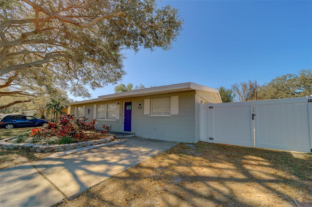 11128 116th Street Largo, FL 33778 - Photo 49 of 50 a view of a house with a backyard