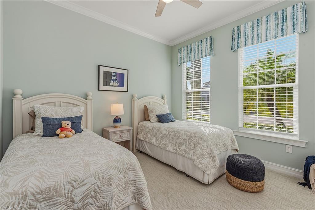 14685 Kelson Circle Naples, FL 34114 - Photo 12 of 50 a bedroom with two beds and a window