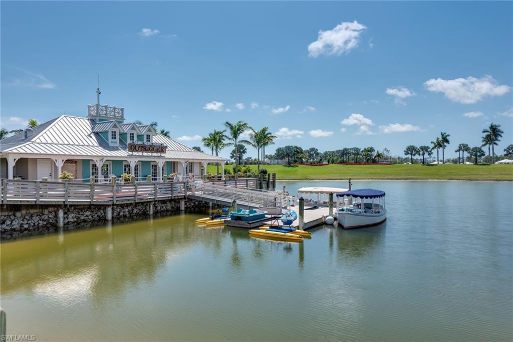 14685 Kelson Circle Naples, FL 34114 - Photo 43 of 50 a view of a swimming pool with outdoor seating
