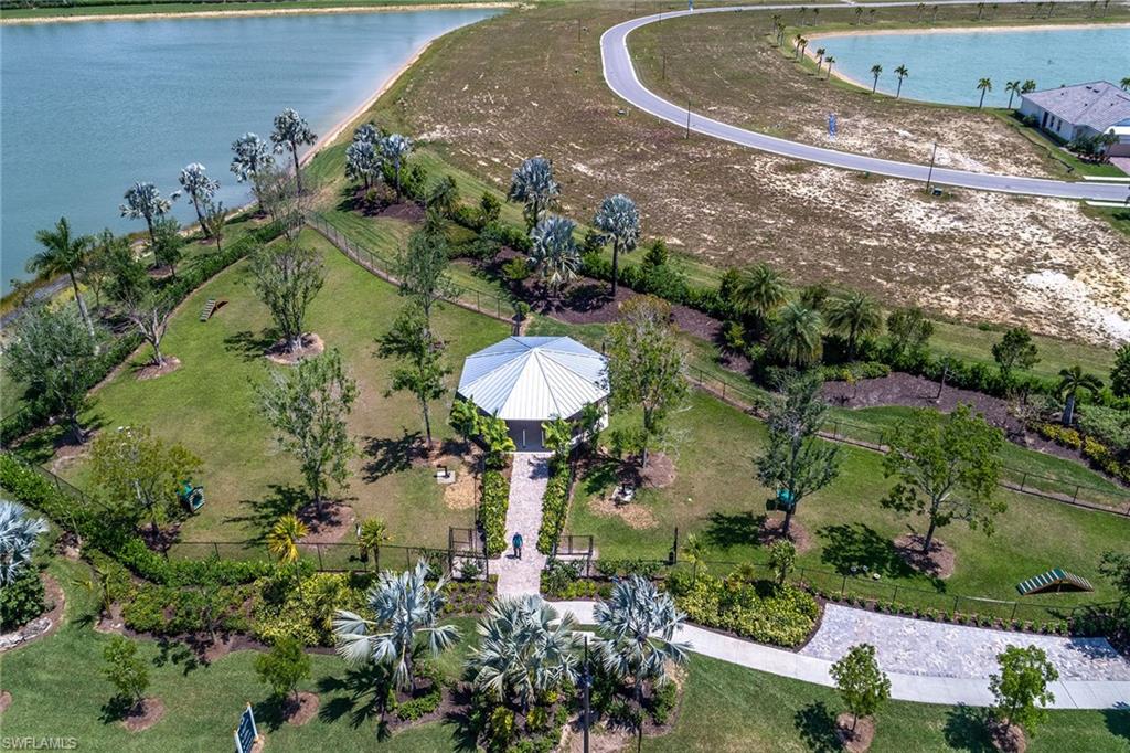 14685 Kelson Circle Naples, FL 34114 - Photo 46 of 50 an aerial view of a house with a yard and lake view