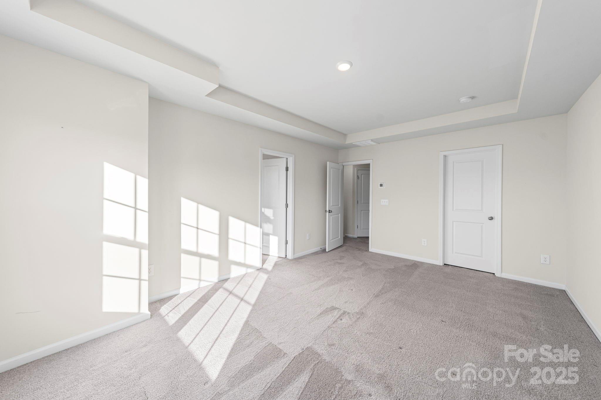 5044 Moss Pine Way Tega Cay, SC 29708 - Photo 22 of 40 a view of an empty room with a window