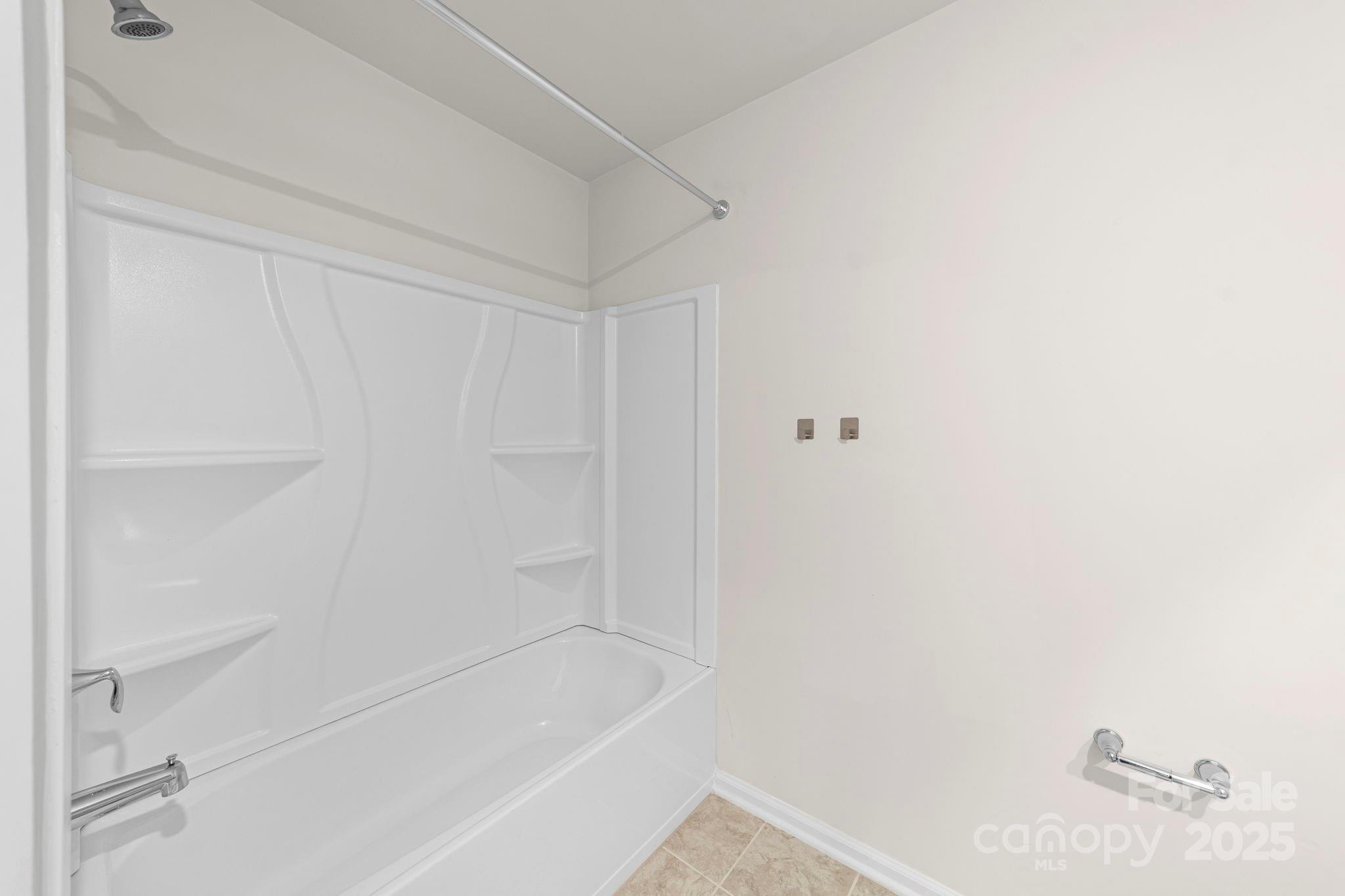 5044 Moss Pine Way Tega Cay, SC 29708 - Photo 28 of 40 a close up of a bathtub