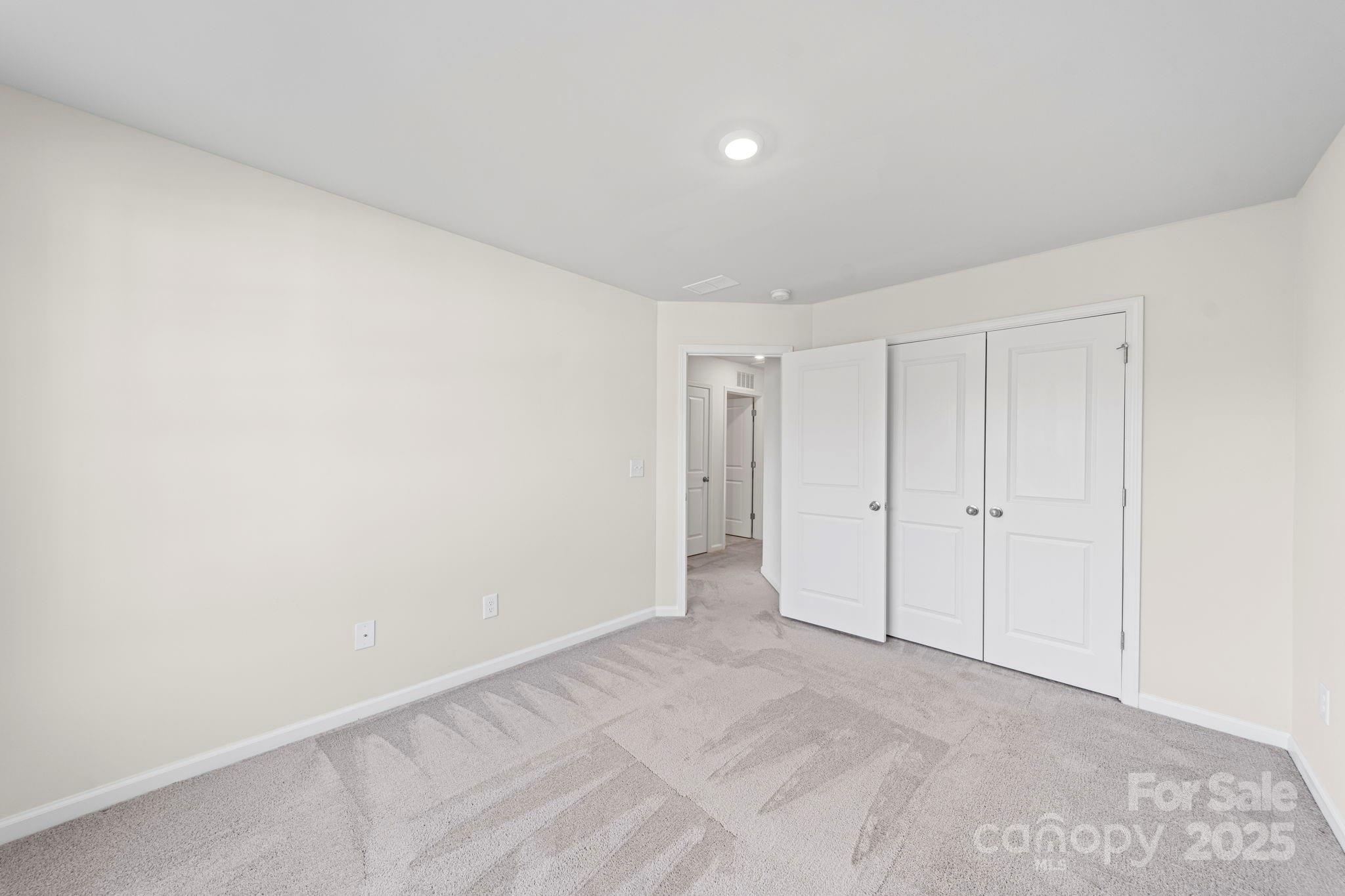 5044 Moss Pine Way Tega Cay, SC 29708 - Photo 30 of 40 a view of an empty room