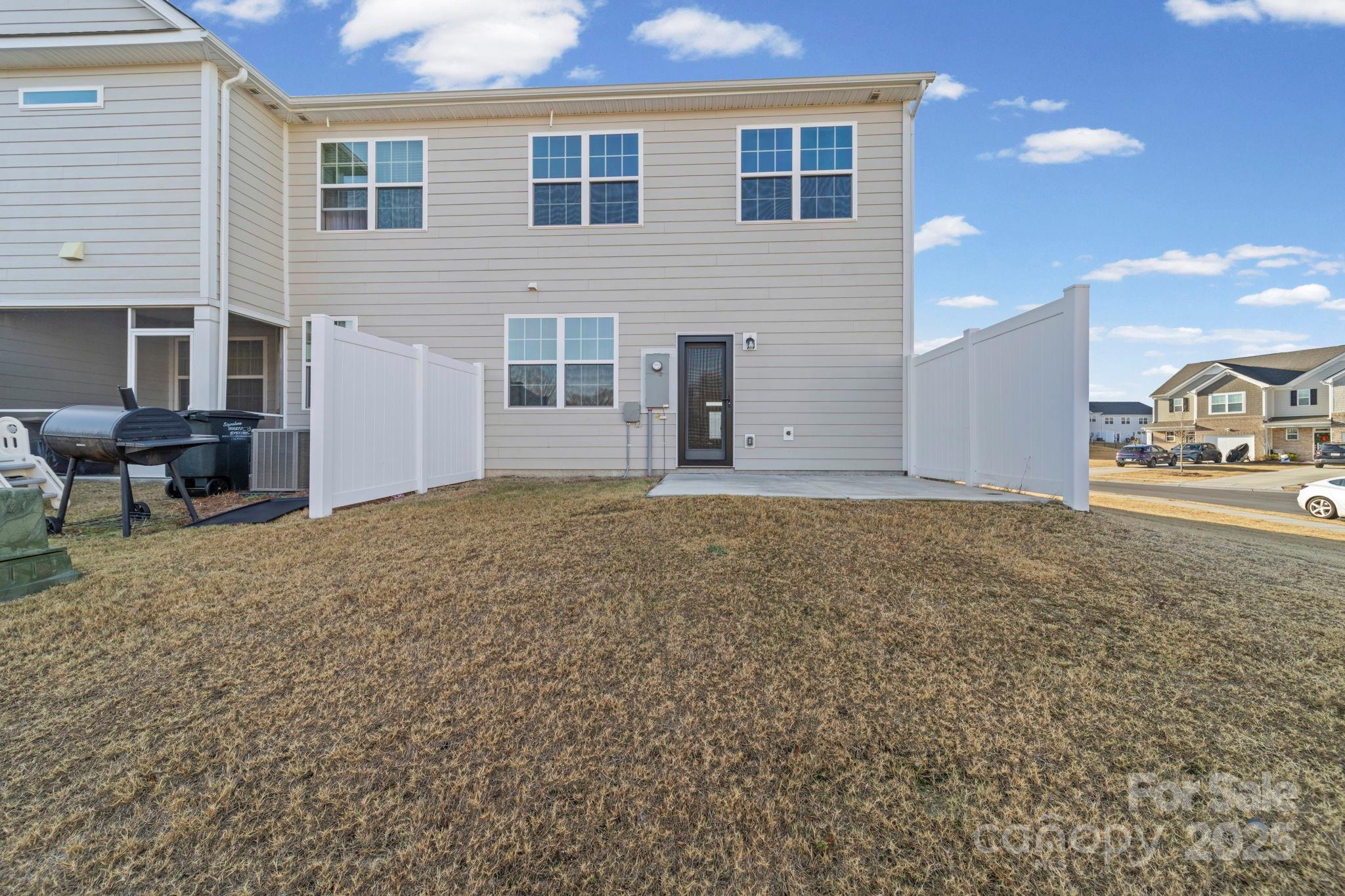 5044 Moss Pine Way Tega Cay, SC 29708 - Photo 39 of 40 a view of an house with backyard space