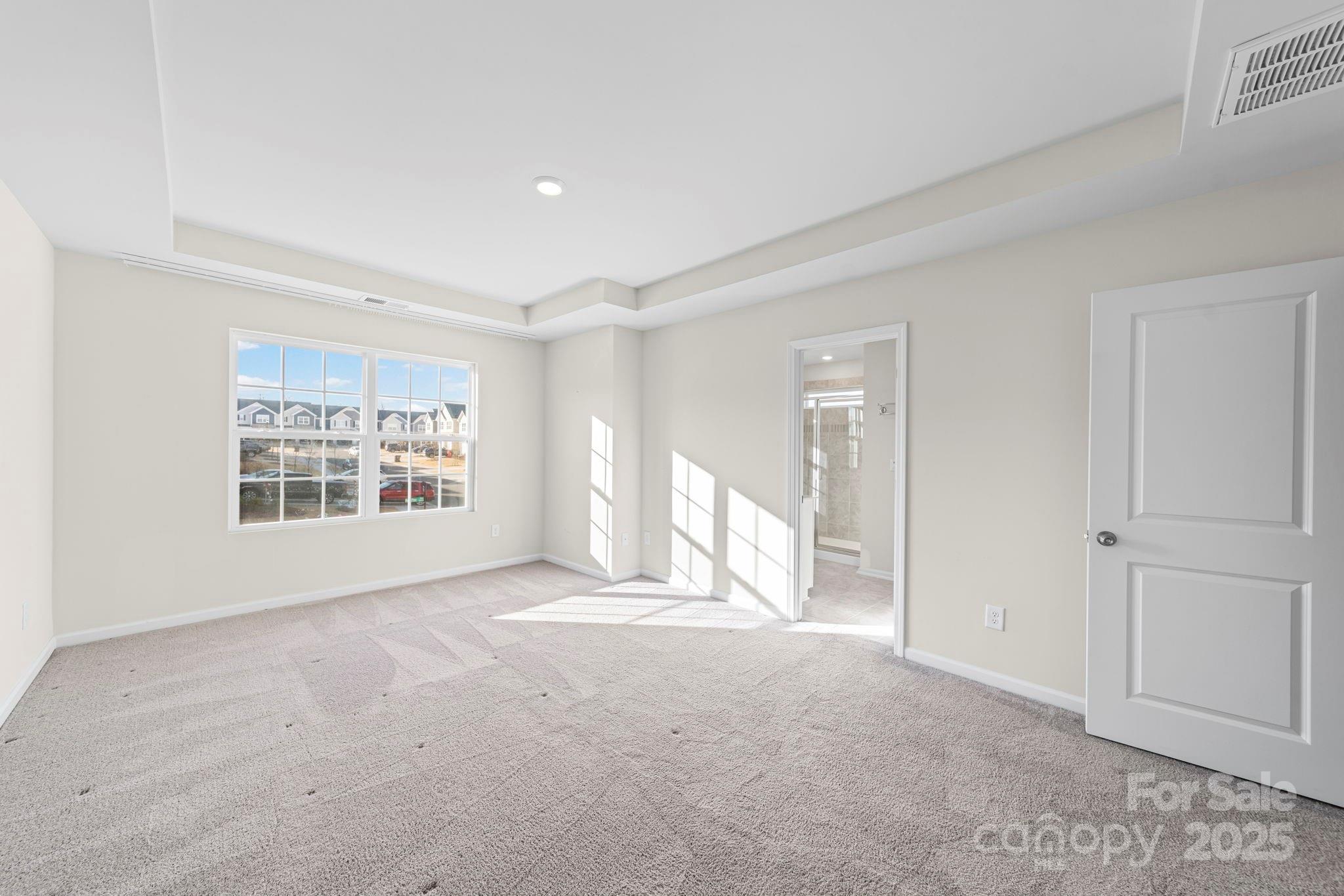 5044 Moss Pine Way Tega Cay, SC 29708 - Photo 6 of 40 a view of an empty room with a window