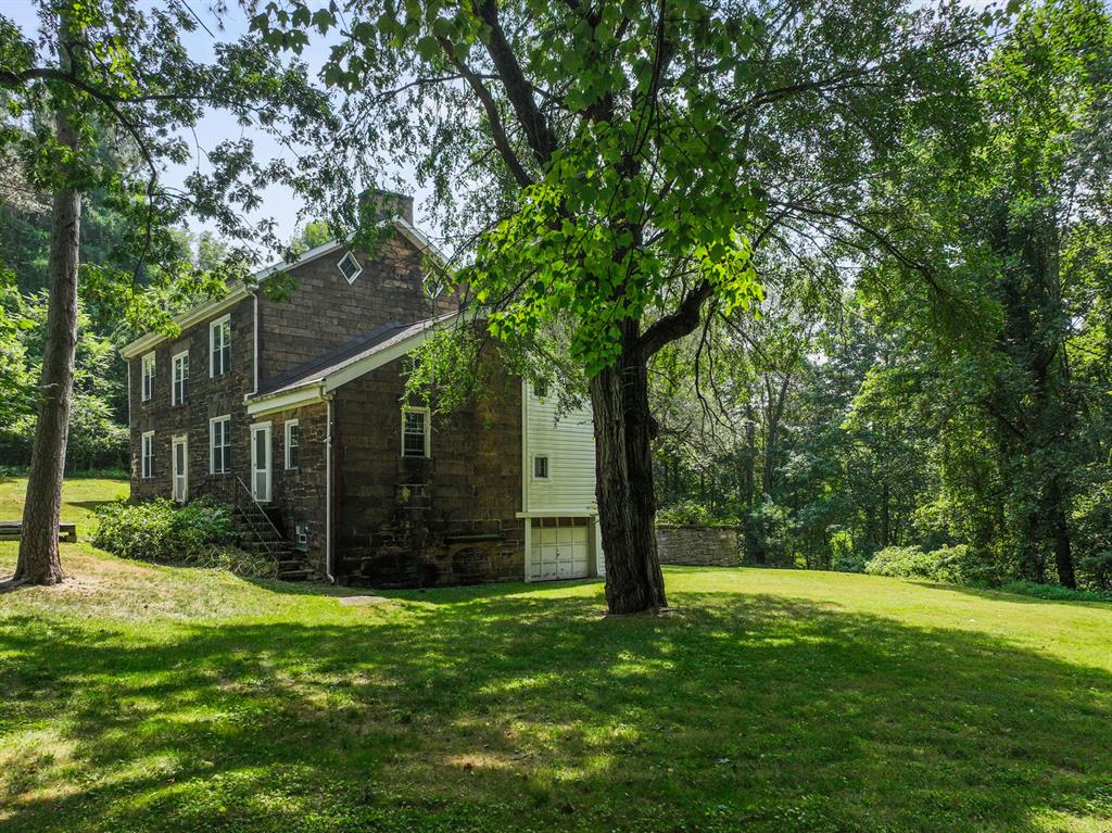 1010 Beaner Hollow Road Beaver, PA 15009 - Photo 11 of 48 a view of a house with a small yard