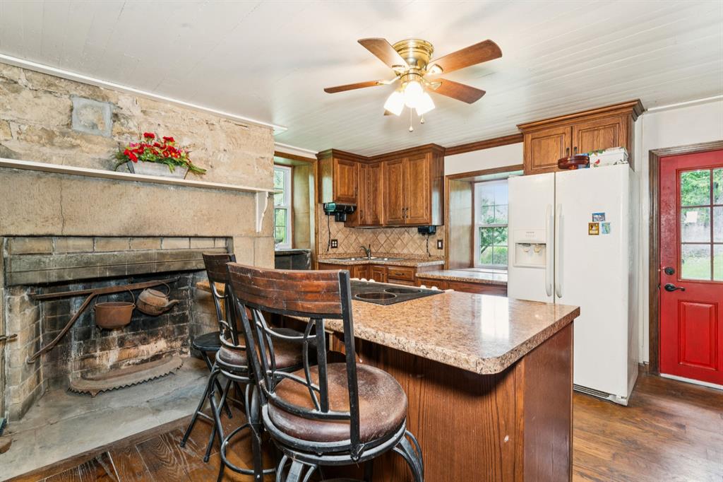 1010 Beaner Hollow Road Beaver, PA 15009 - Photo 29 of 48 a kitchen with a table and chairs