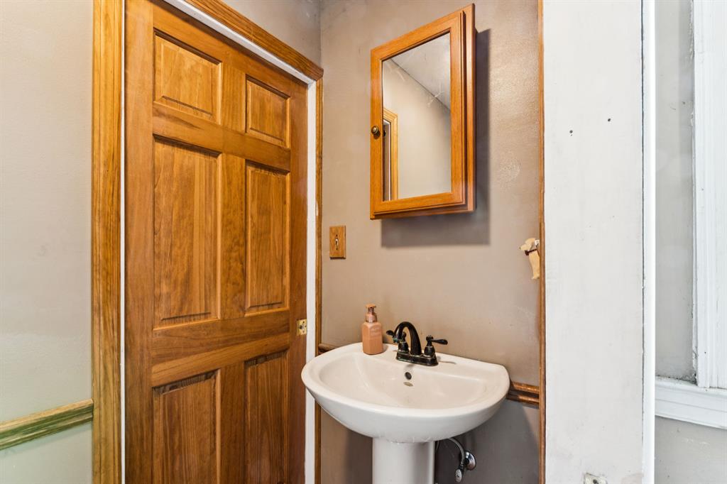 1010 Beaner Hollow Road Beaver, PA 15009 - Photo 35 of 48 a bathroom with a sink and a mirror