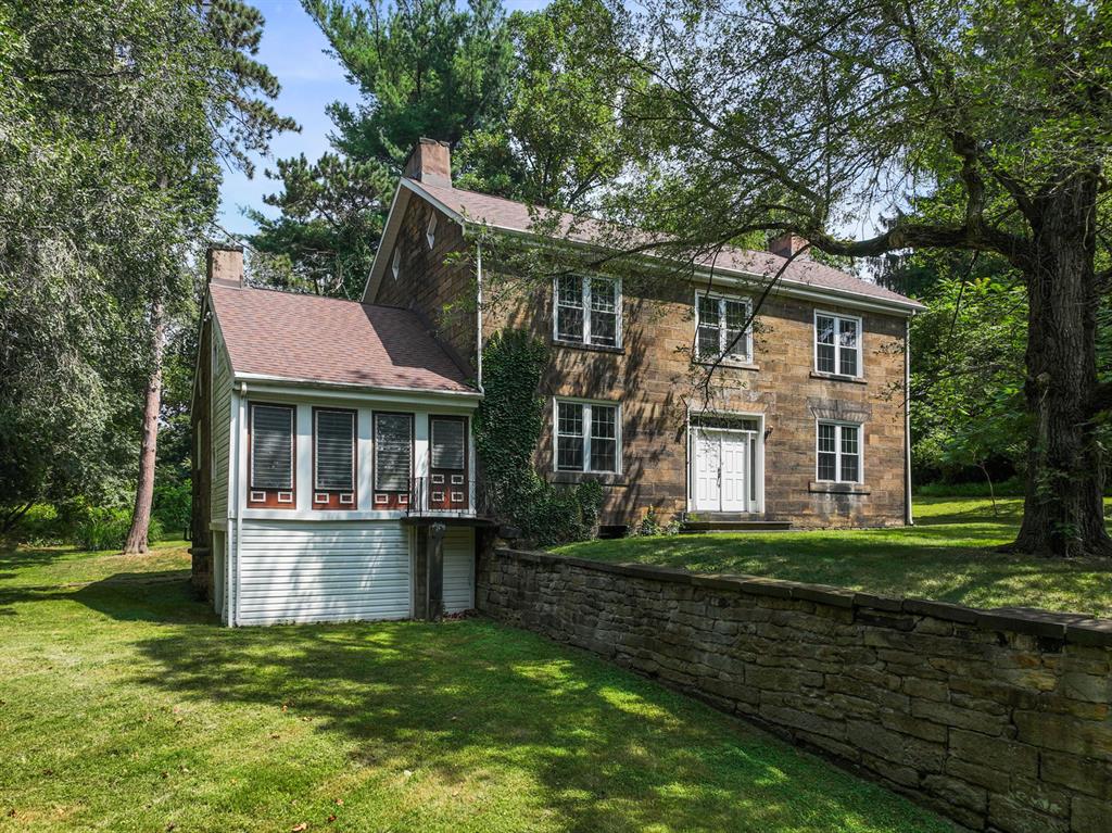 1010 Beaner Hollow Road Beaver, PA 15009 - Photo 10 of 48 a front view of a house with a yard