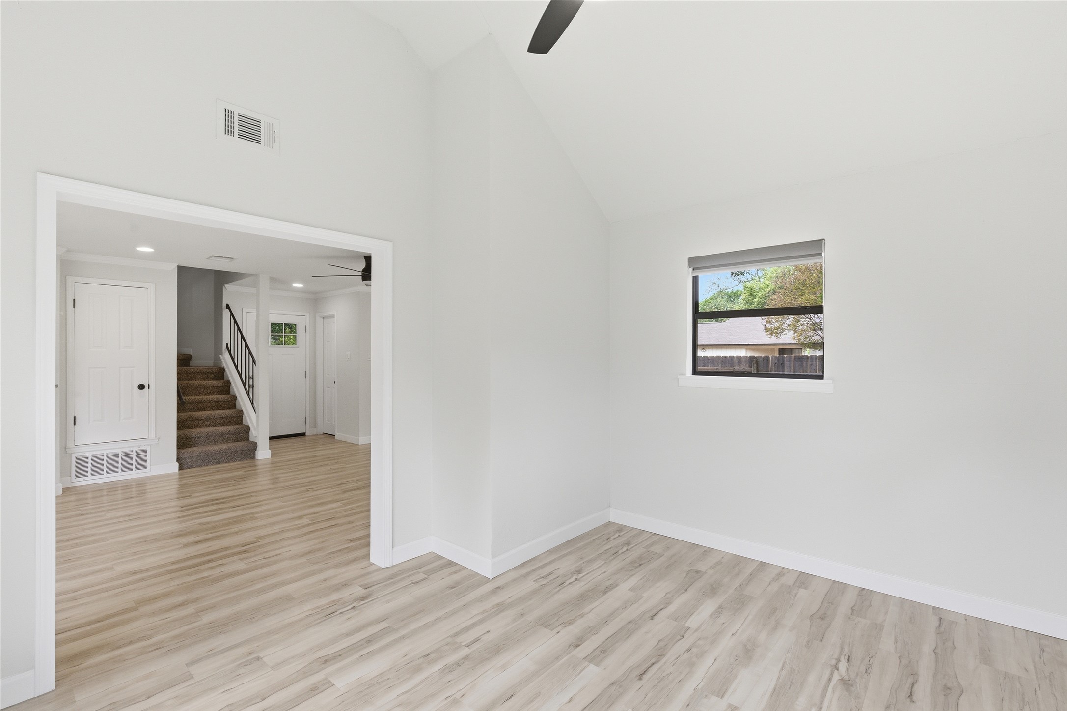 2326 Dowd Lane Austin, TX 78728 - Photo 16 of 30 wooden floor in an empty room with a window