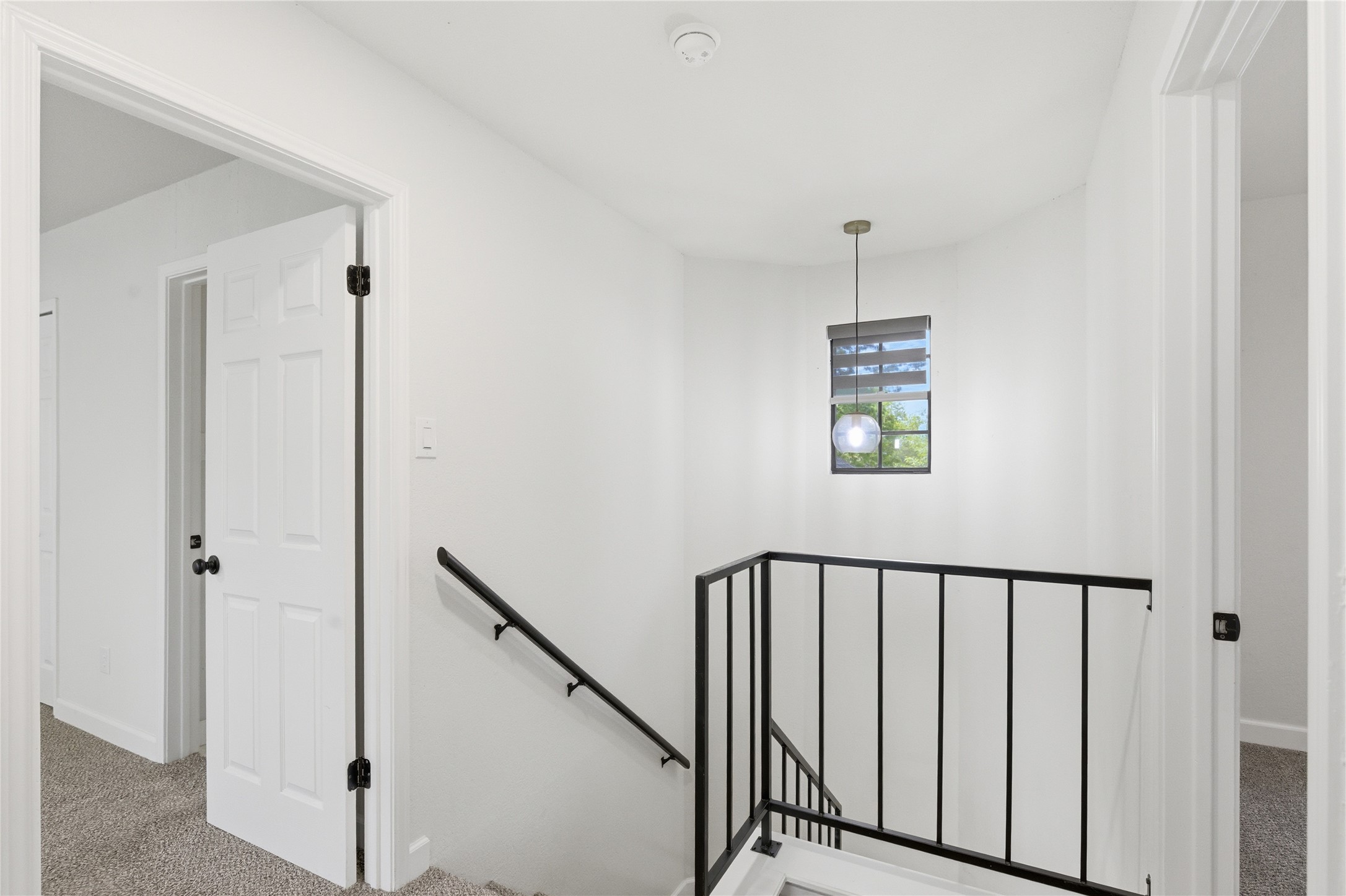 2326 Dowd Lane Austin, TX 78728 - Photo 18 of 30 a view of a hallway with windows