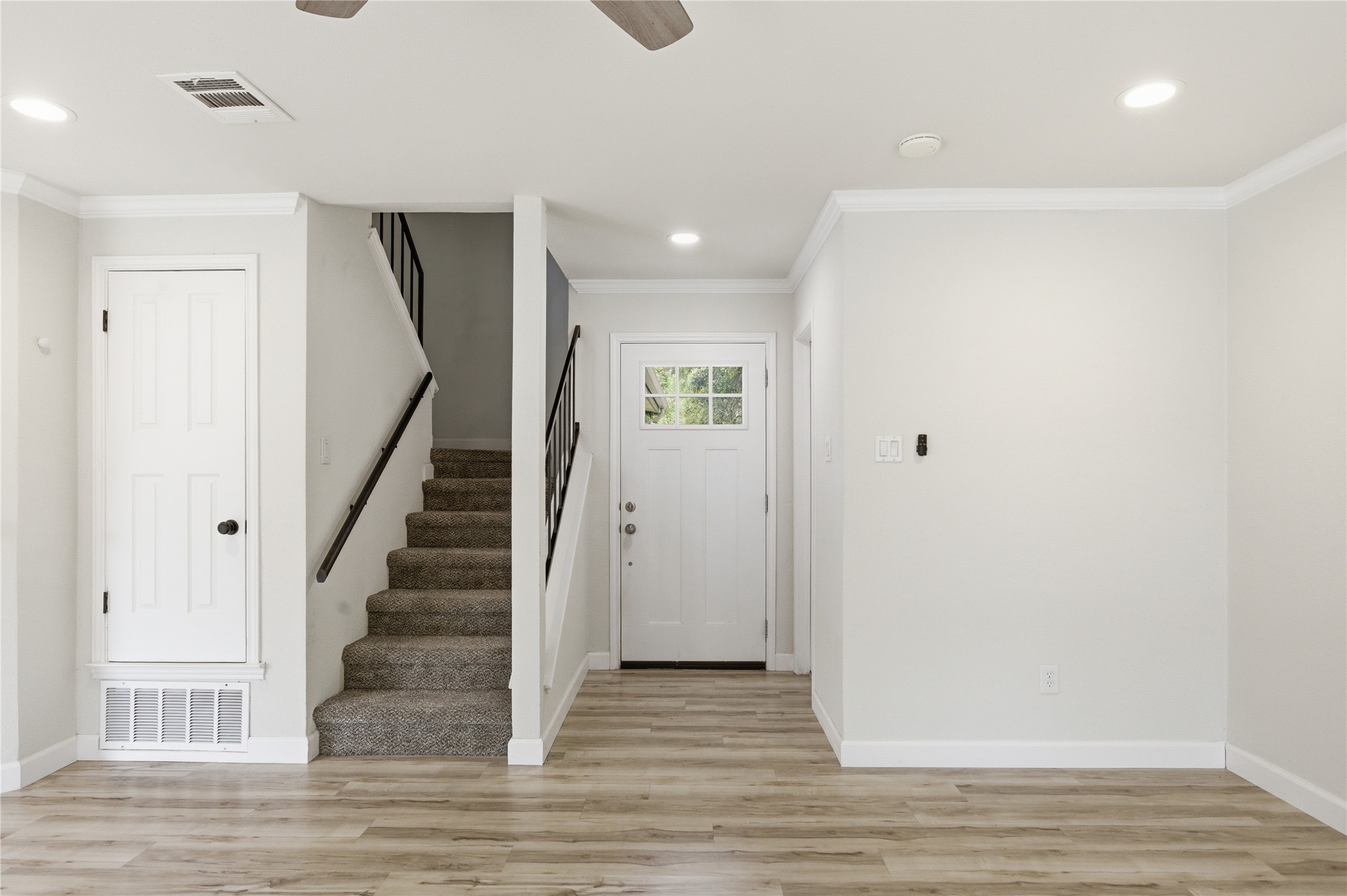 2326 Dowd Lane Austin, TX 78728 - Photo 10 of 30 a view of a hallway with wooden floor and entryway