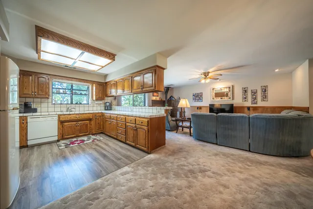 a kitchen with lots of counter top space and a sink