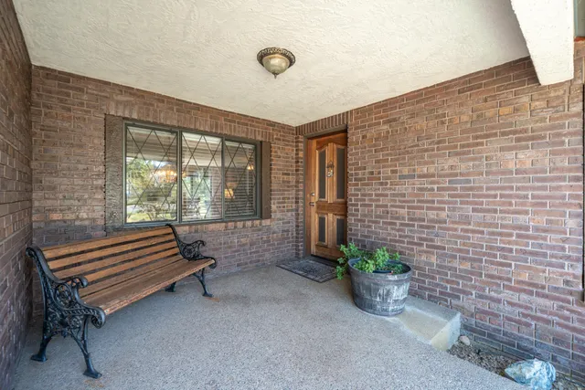 a outdoor space with a couch and swing chair