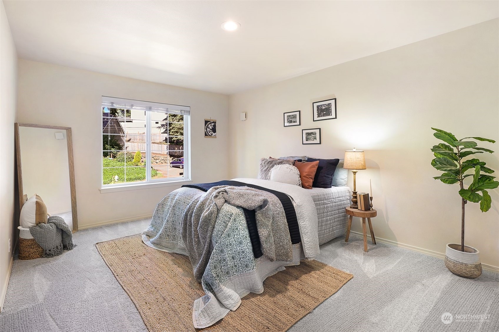 17905 Circle Drive Bothell, WA 98011 - Photo 17 of 39 a bedroom with a bed and a couch