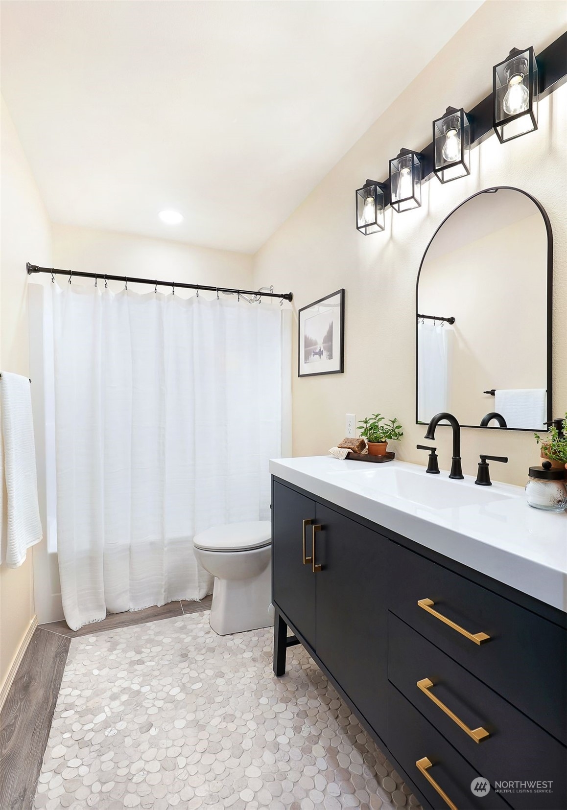 17905 Circle Drive Bothell, WA 98011 - Photo 20 of 39 a bathroom with a double vanity sink and a mirror