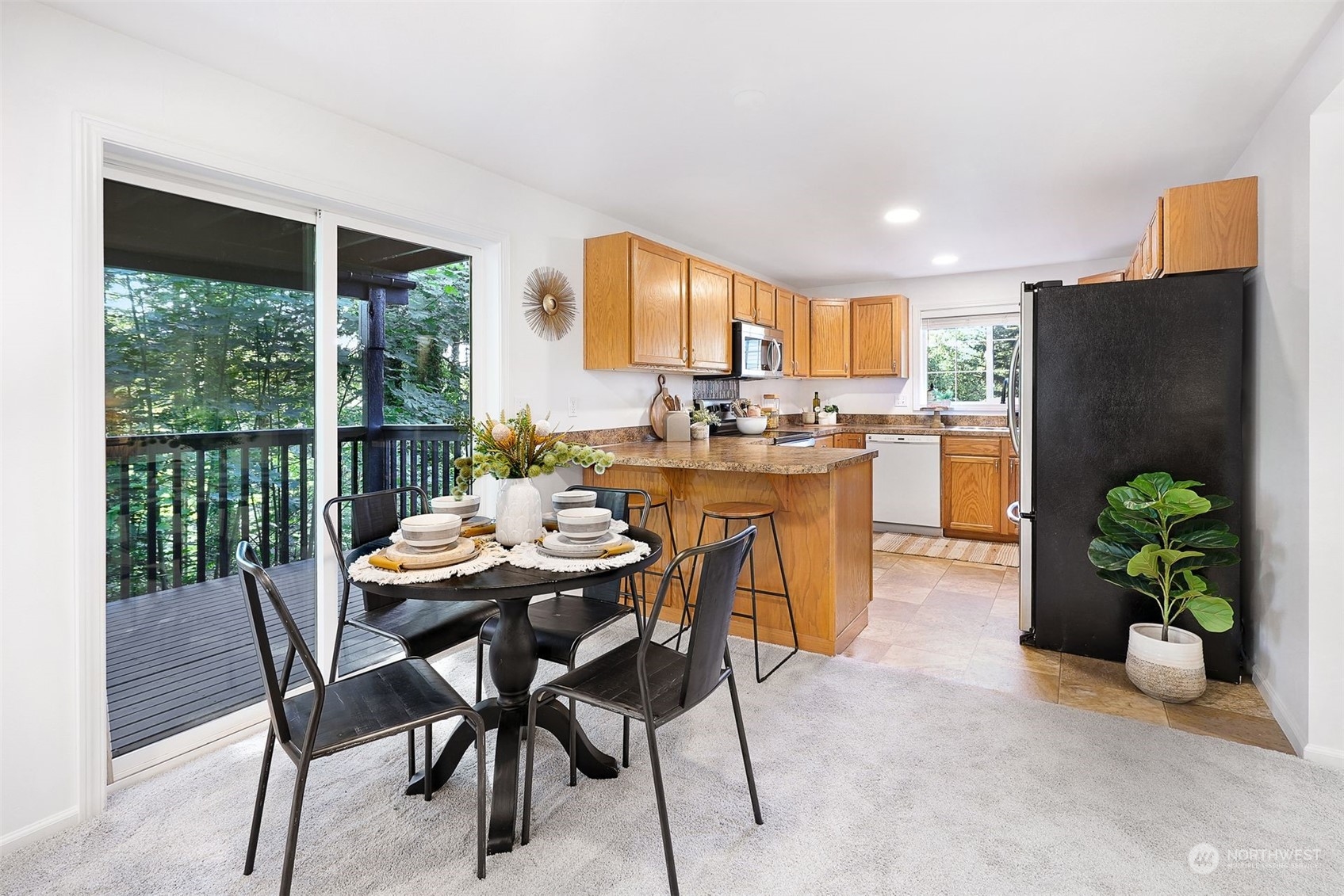 17905 Circle Drive Bothell, WA 98011 - Photo 24 of 39 a dining room with furniture and window