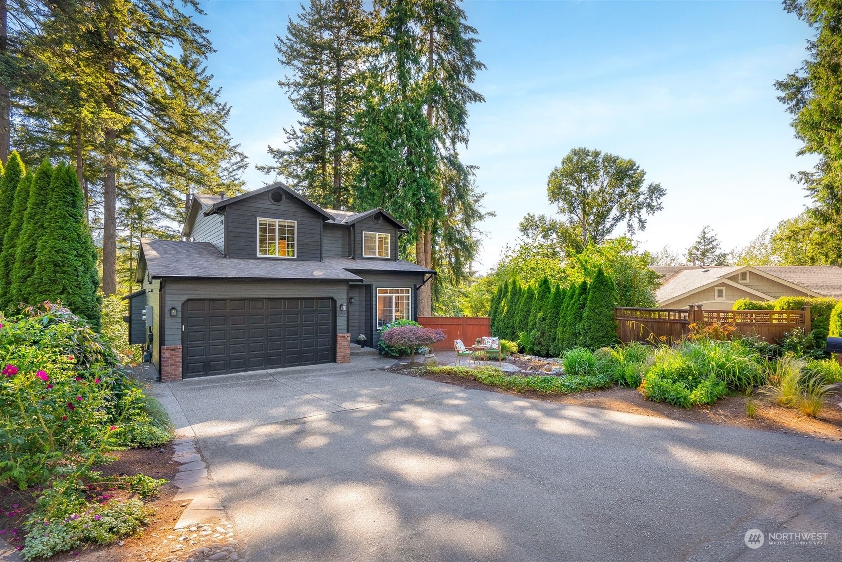 17905 Circle Drive Bothell, WA 98011 - Photo 35 of 39 a view of a house with a yard and garage