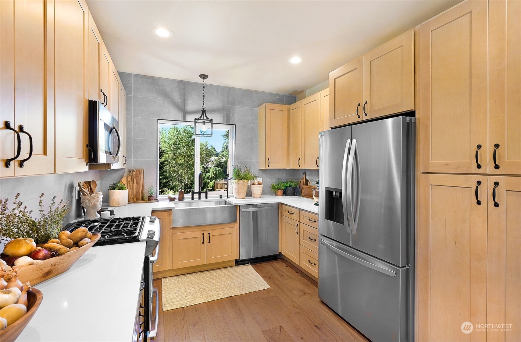 17905 Circle Drive Bothell, WA 98011 - Photo 8 of 39 a kitchen with refrigerator and cabinets