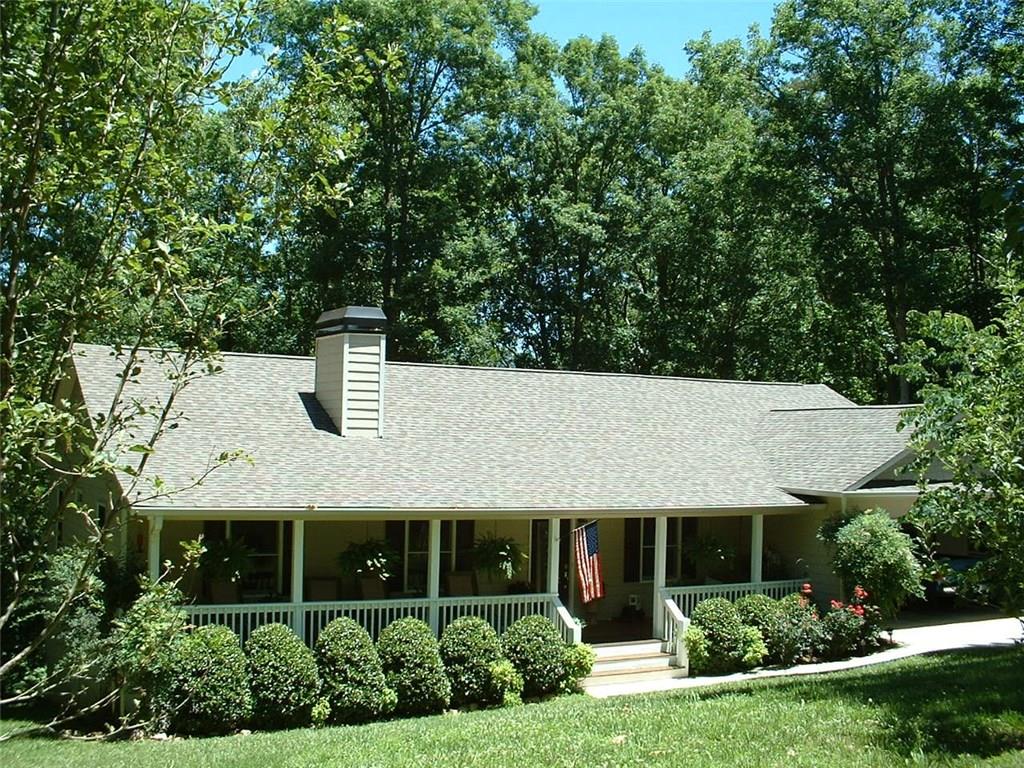 507 Old Cove Road North Jasper, GA 30143 - Photo 1 of 1 FRONT VIEW OF HOME WITH CONCRETE SIDING, 2 CAR ATTACHED GARAGE, MANICURED YARD.