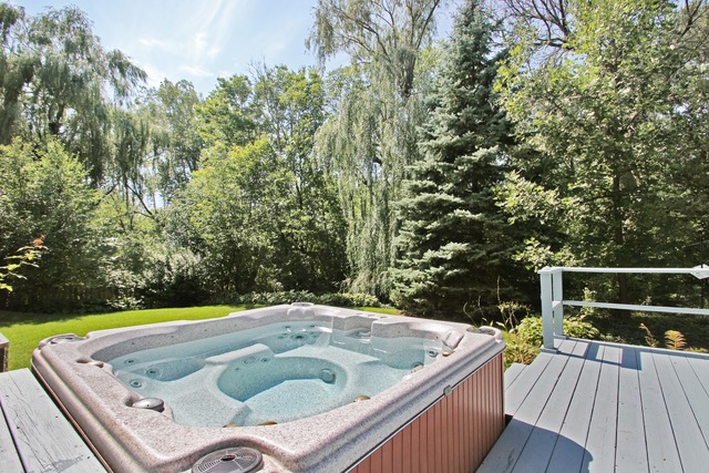 1728 Riverside Court Glenview, IL 60025 - Photo 16 of 18 a view of a swimming pool with a patio