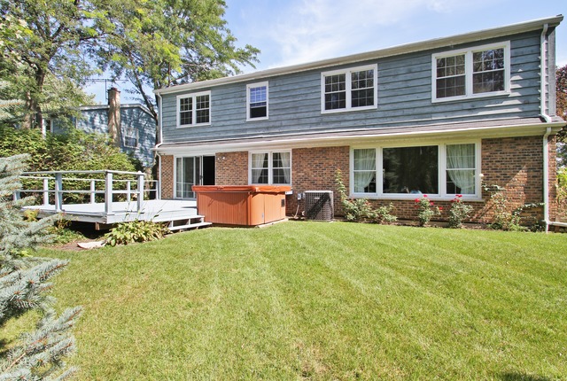 1728 Riverside Court Glenview, IL 60025 - Photo 18 of 18 a front view of house with yard
