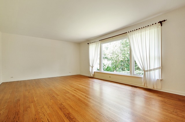 1728 Riverside Court Glenview, IL 60025 - Photo 2 of 18 a view of empty room with wooden floor and fan