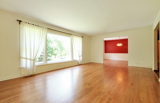 1728 Riverside Court Glenview, IL 60025 - Photo 3 of 18 an empty room with wooden floor and windows
