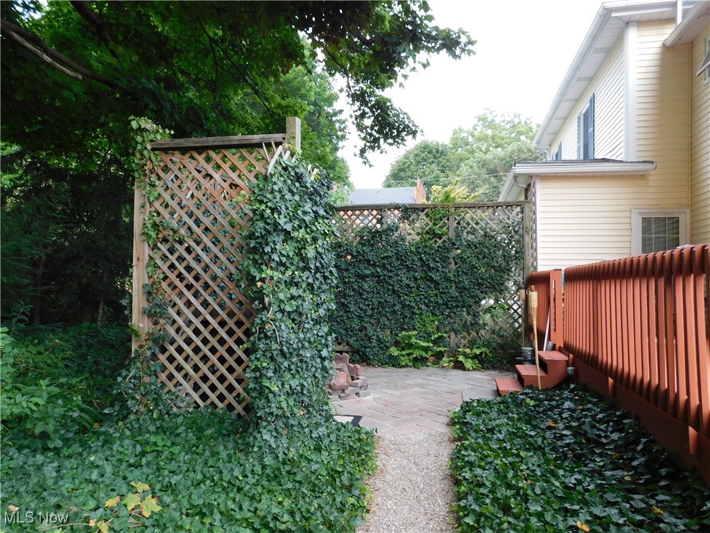 3470 County Line Road Madison, OH 44057 - Photo 10 of 48 View of yard with a private patio