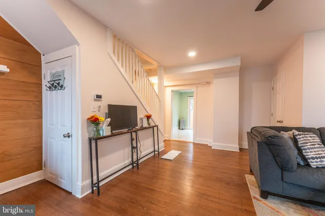 a view of livingroom with furniture and stairs