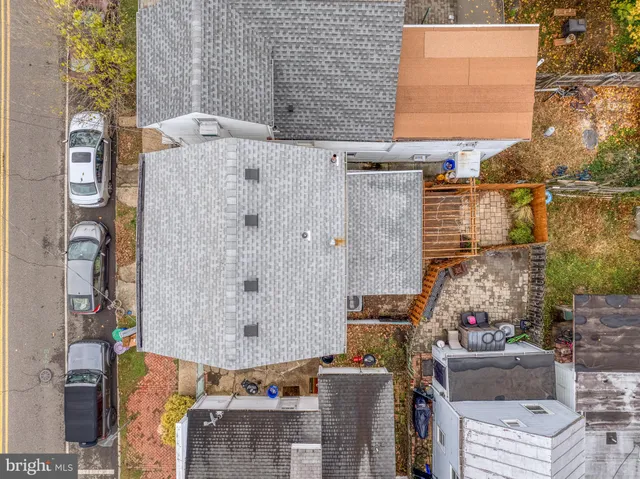a aerial view of a house with parking space