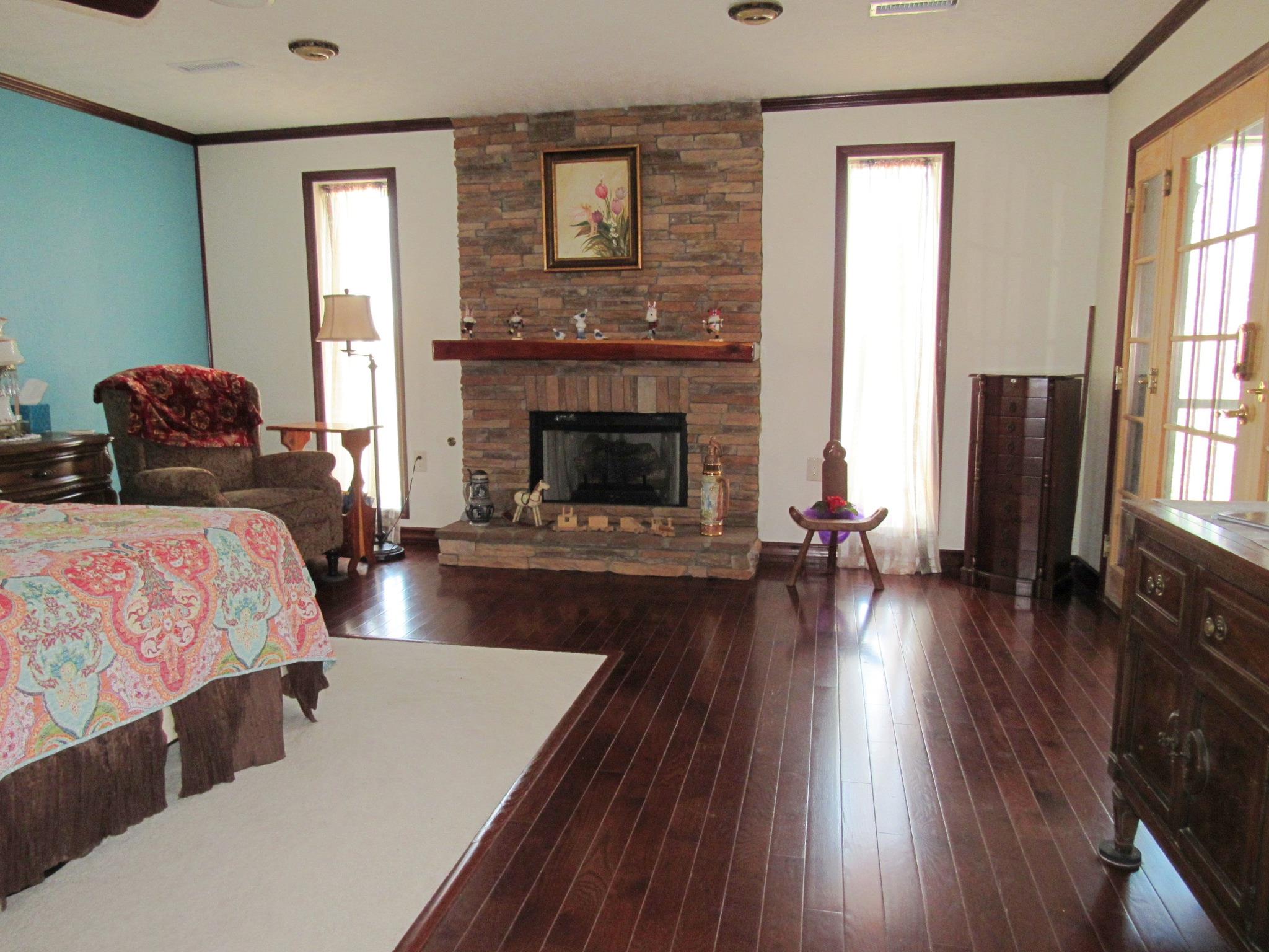 2486 Armstrong Road Linden, TN 37096 - Photo 13 of 30 Master Bedroom has fireplace, huge walk in closet