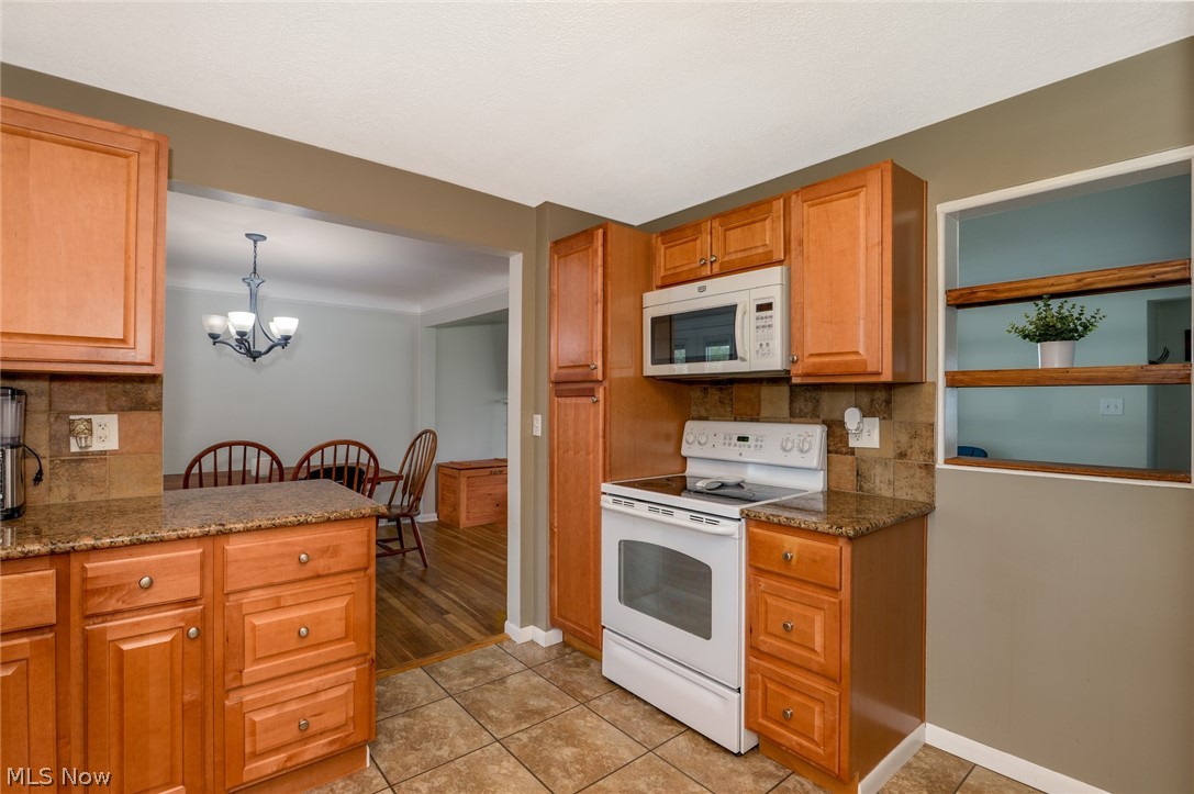 1304 Ford Road Lyndhurst, OH 44124 - Photo 4 of 29 KITCHEN LOOKING INTO DINING ROOM