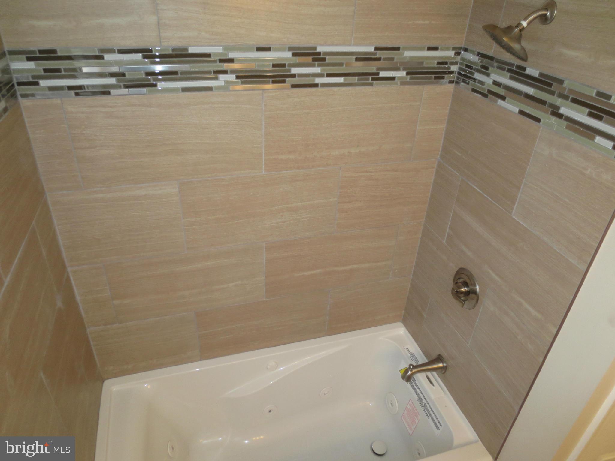 1801 Heathfield Road Baltimore, MD 21239 - Photo 12 of 28 a bathroom with a shower