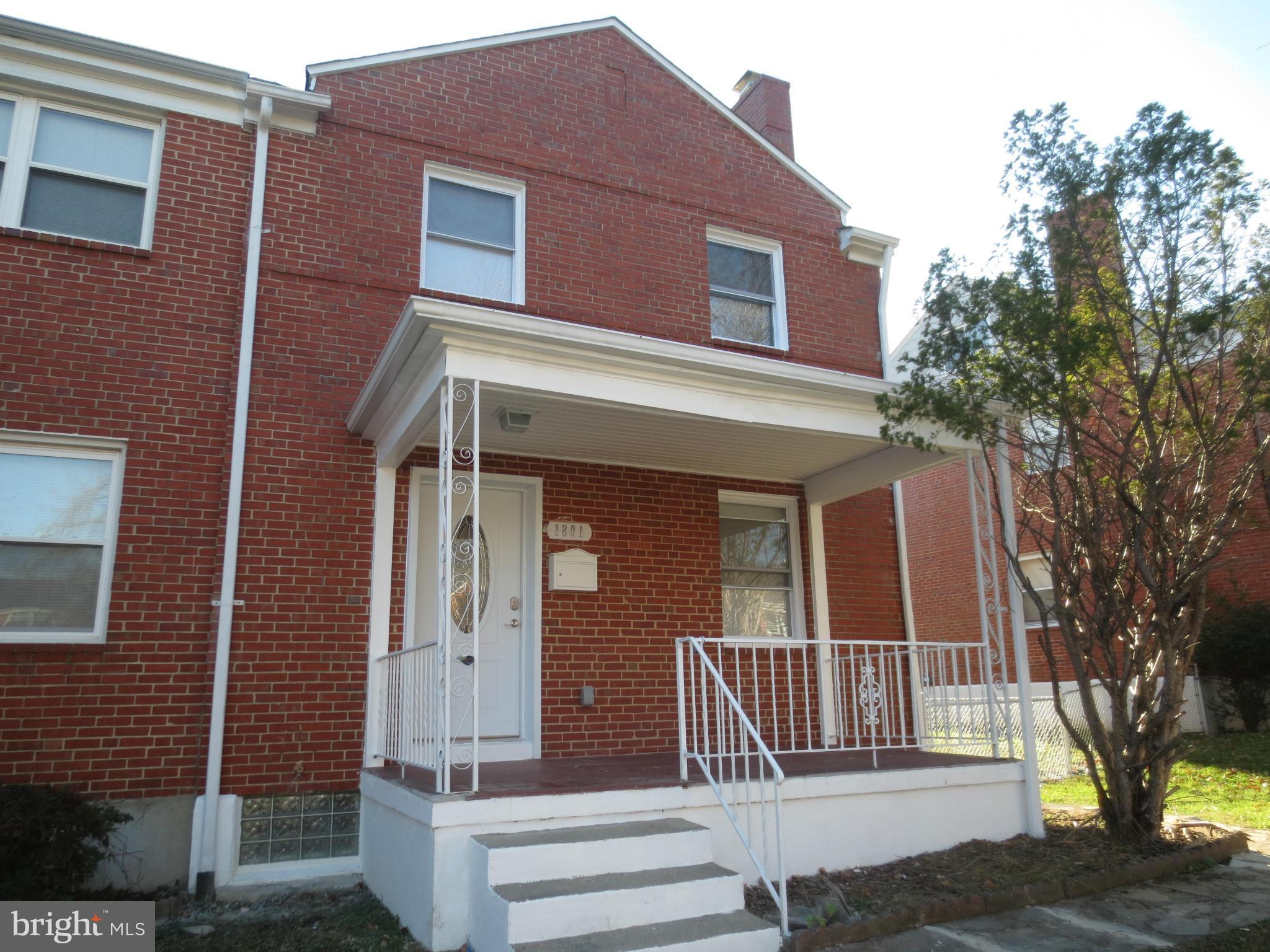 1801 Heathfield Road Baltimore, MD 21239 - Photo 27 of 28 a front view of a house