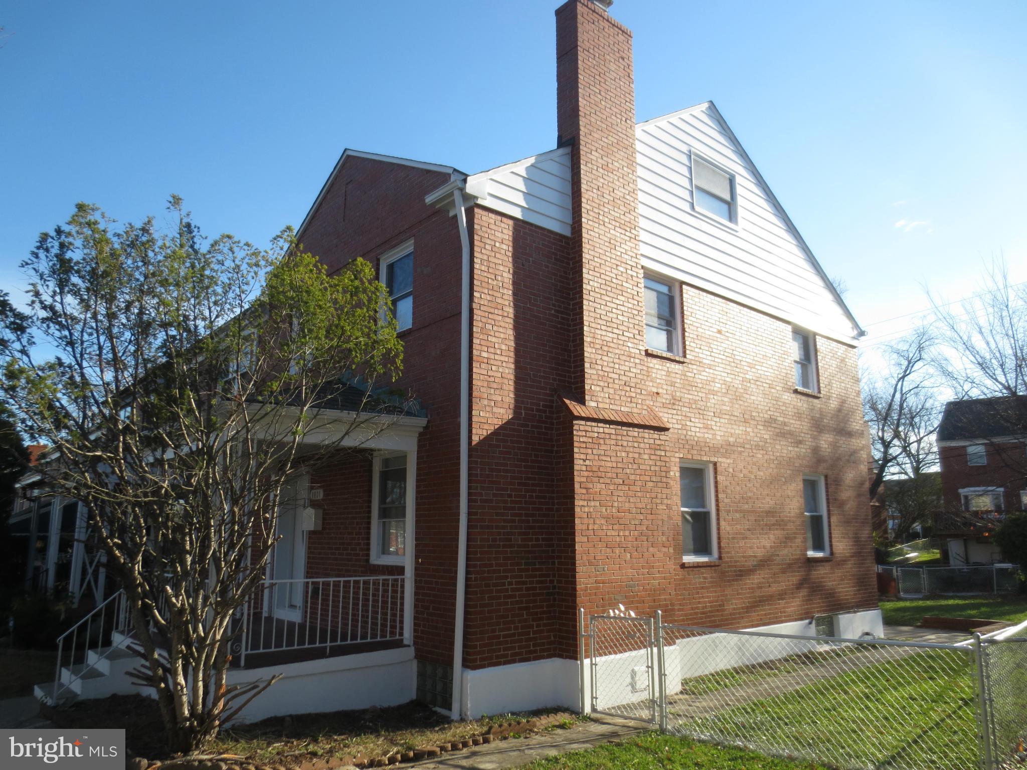 1801 Heathfield Road Baltimore, MD 21239 - Photo 28 of 28 a front view of a house with garden