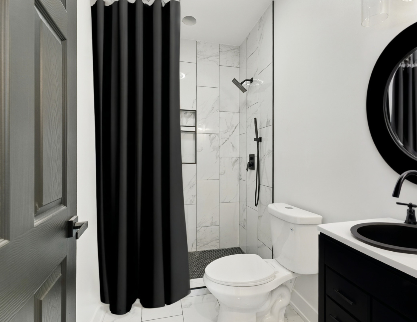 6327 South Langley Avenue, Unit 2 Chicago, IL 60637 - Photo 8 of 10 a bathroom with a toilet a sink and a shower