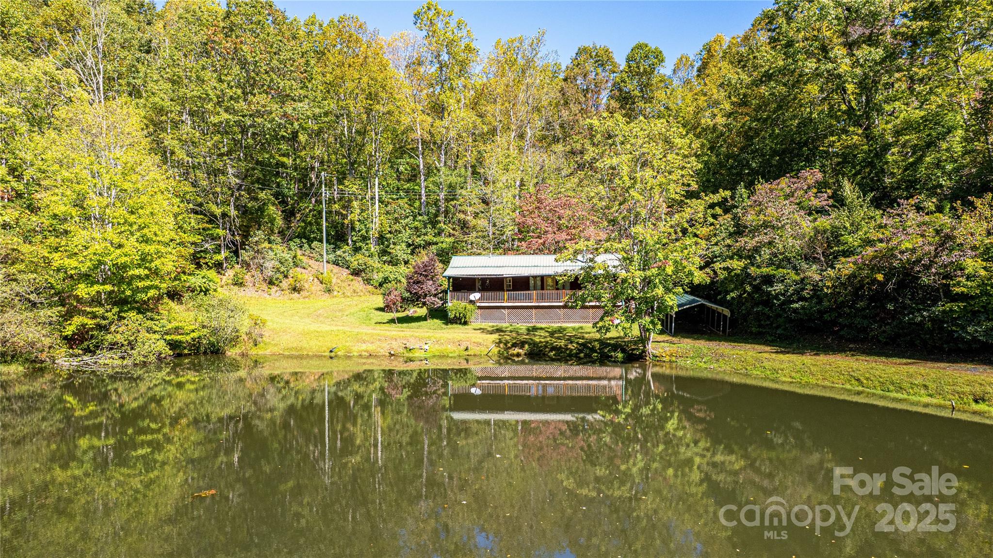 a view of a lake with a large building