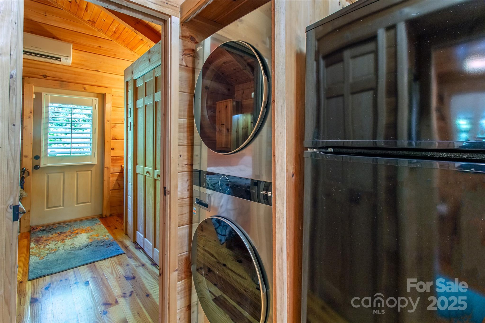 202 Duke Franklin Road Spruce Pine, NC 28777 - Photo 12 of 34 a view of a hallway with washer and dryer