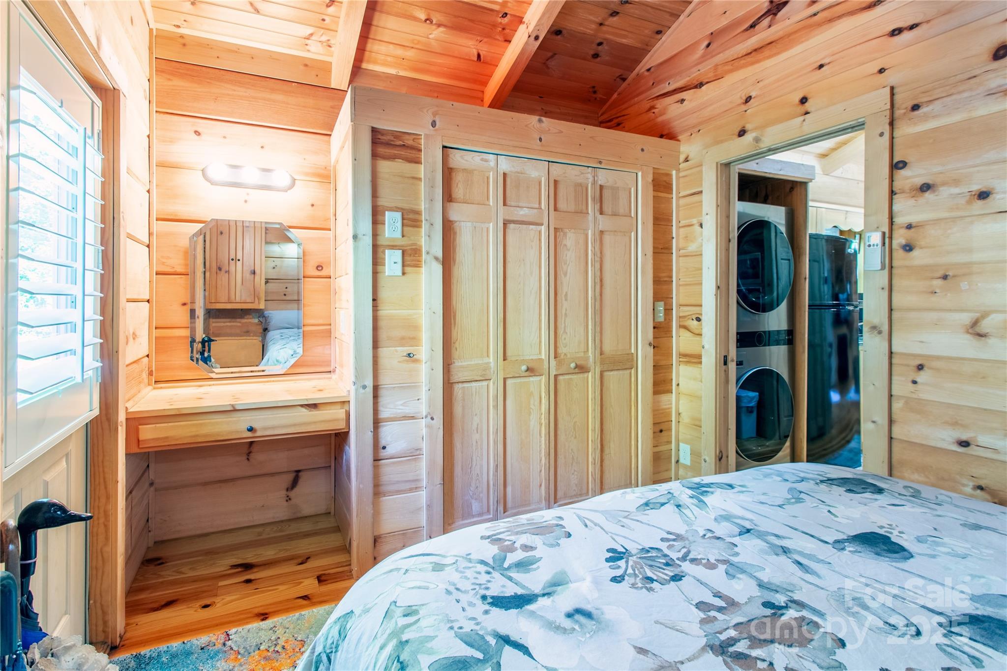 202 Duke Franklin Road Spruce Pine, NC 28777 - Photo 17 of 34 a bedroom with a bed and a window