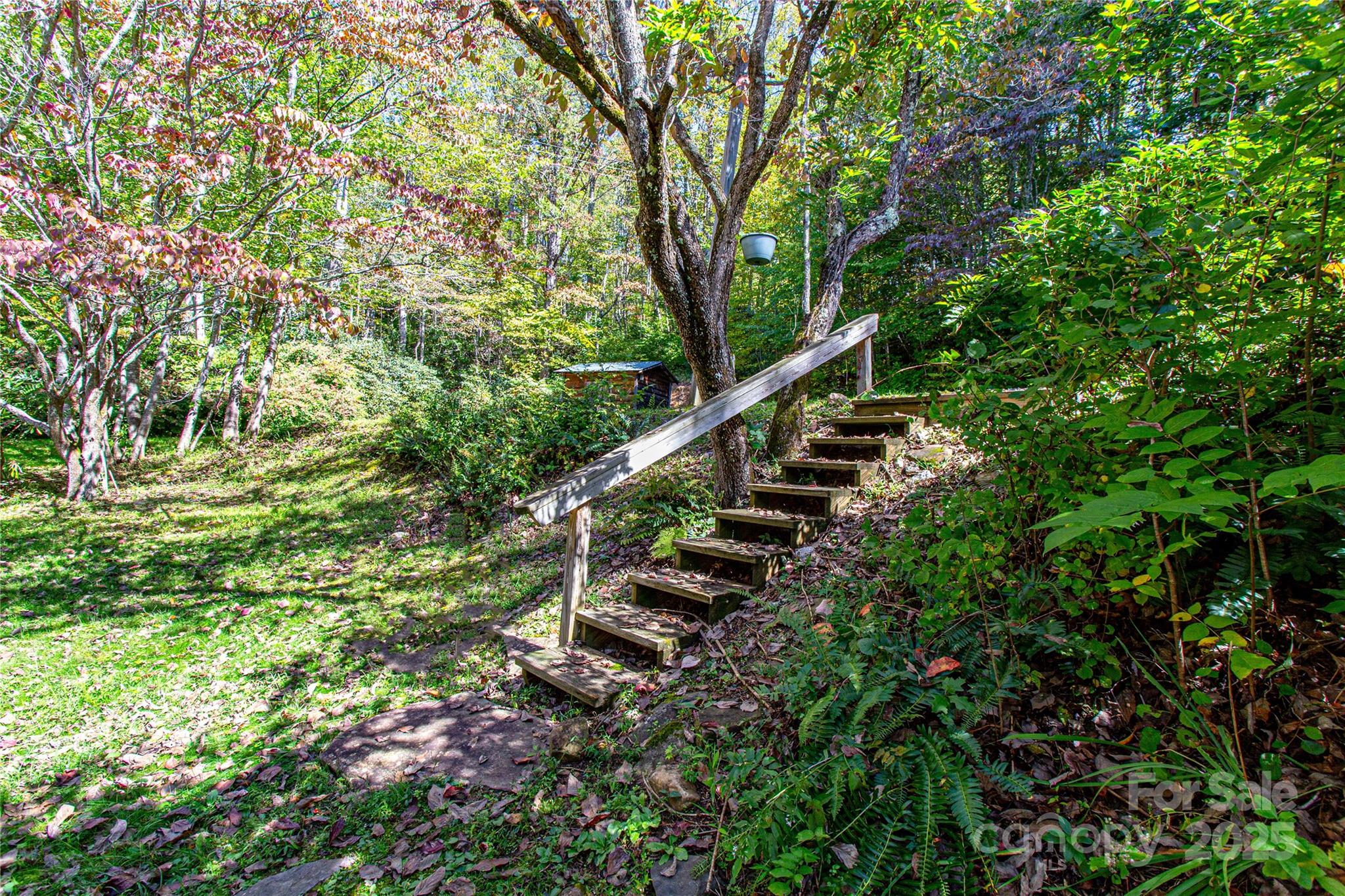 202 Duke Franklin Road Spruce Pine, NC 28777 - Photo 24 of 34 a view of stairs and trees in the background