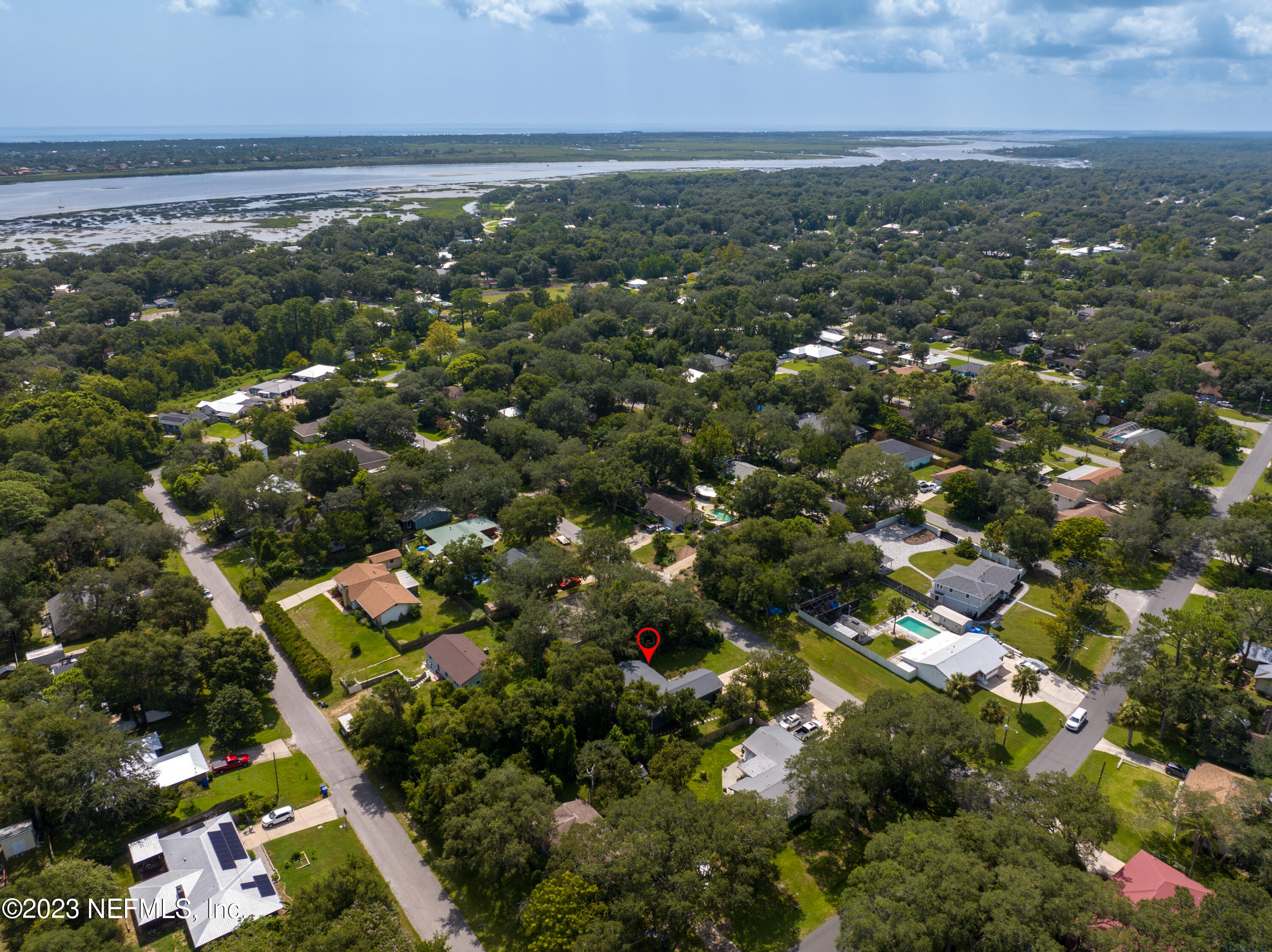 107 Heron Road St. Augustine, FL 32086 - Photo 31 of 39 an aerial view of city and lake