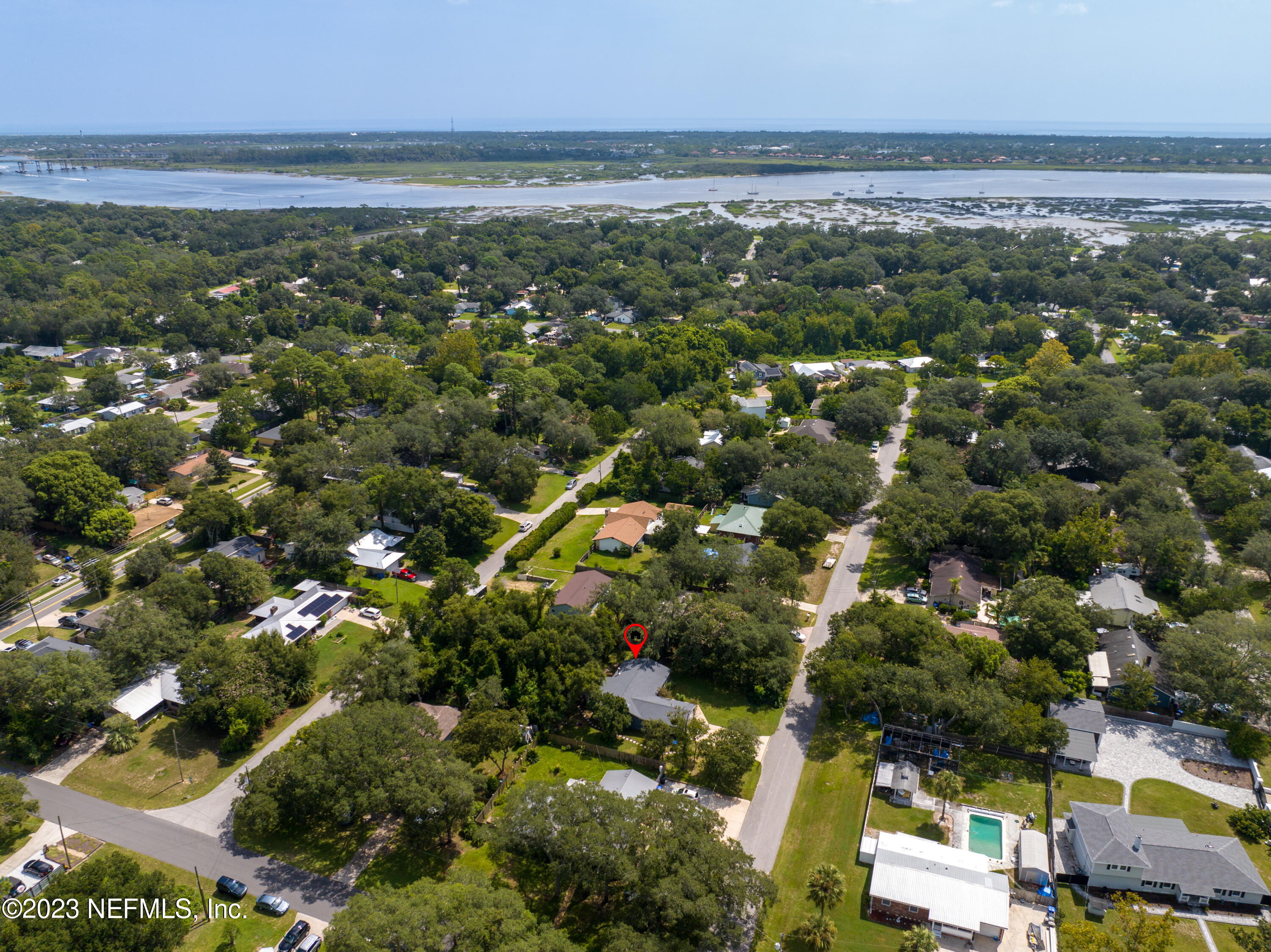 107 Heron Road St. Augustine, FL 32086 - Photo 32 of 39 an aerial view of residential houses with outdoor space and trees