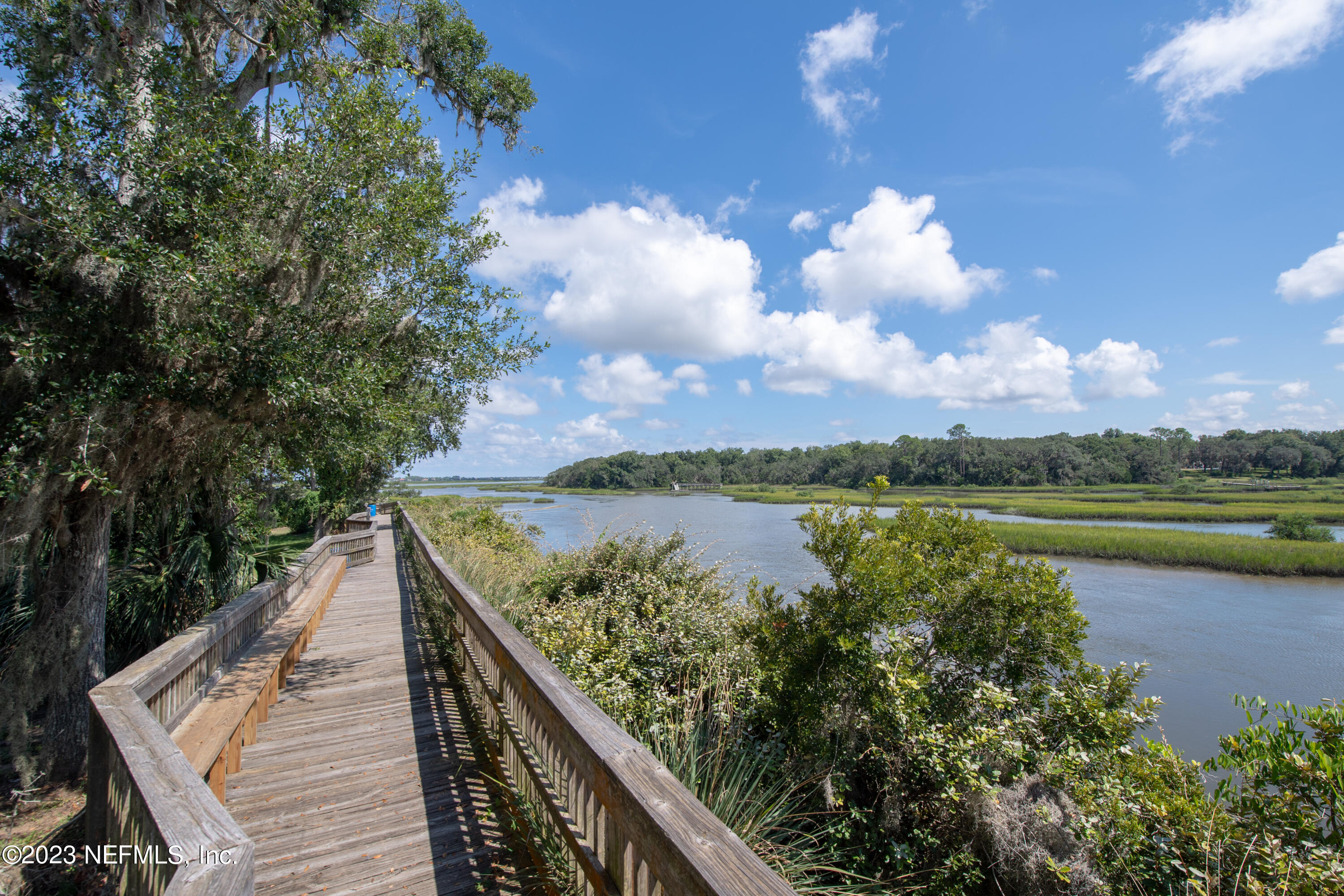 107 Heron Road St. Augustine, FL 32086 - Photo 34 of 39 a view of a lake from a balcony